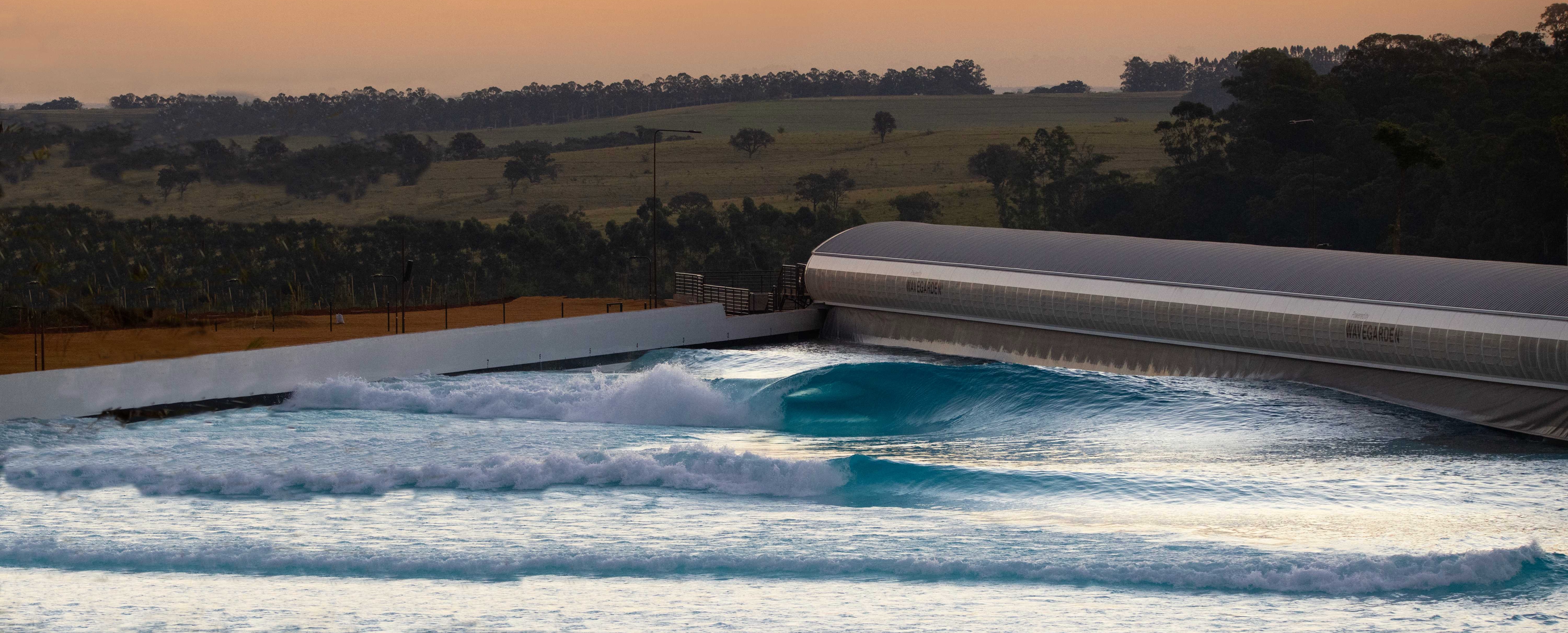 View of the wavegarden cove with waves at sunset